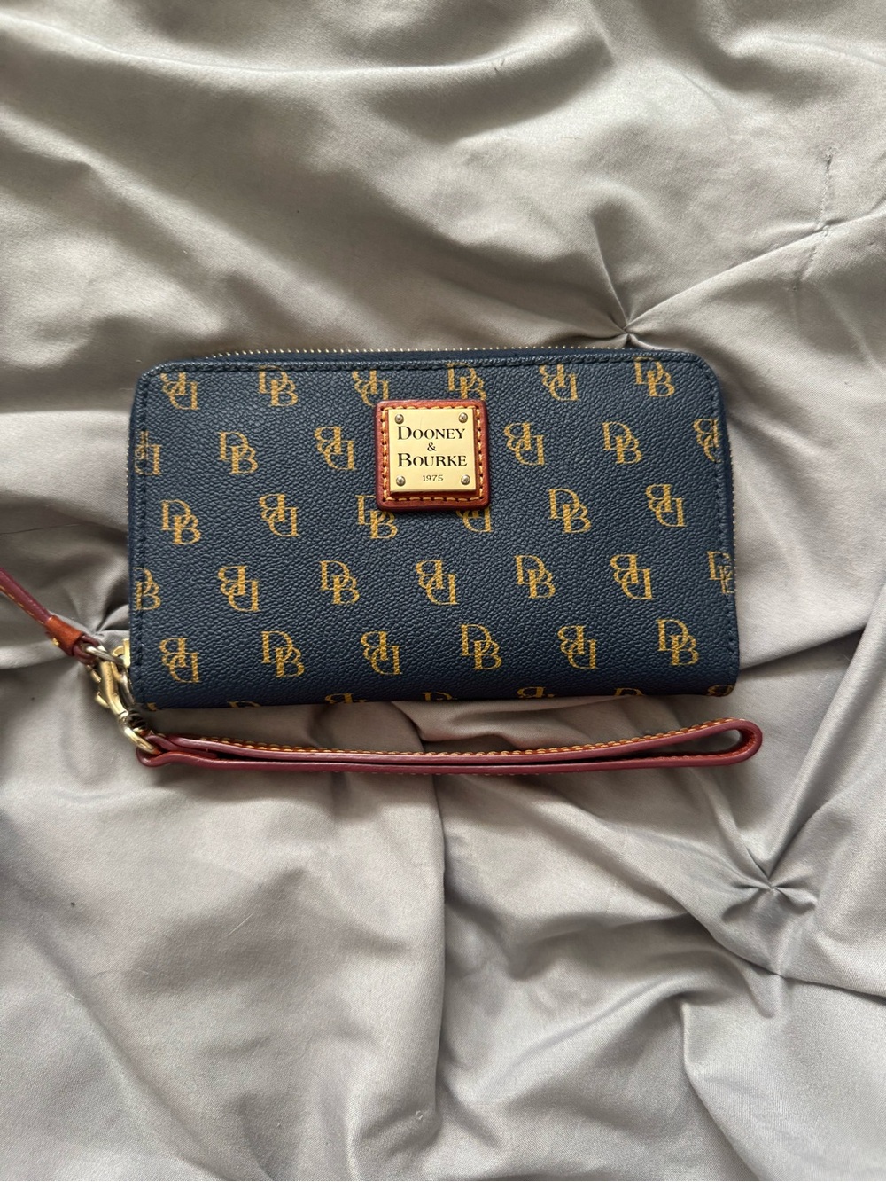 Dooney & Bourke Black Wallet Wristlet with Brown Trim & Gold Plaque